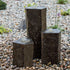 Thumbnail for Blue Thumb Hollowed-Out Basalt Column Outdoor Fountain On Pebbled And Minimalist Landscape