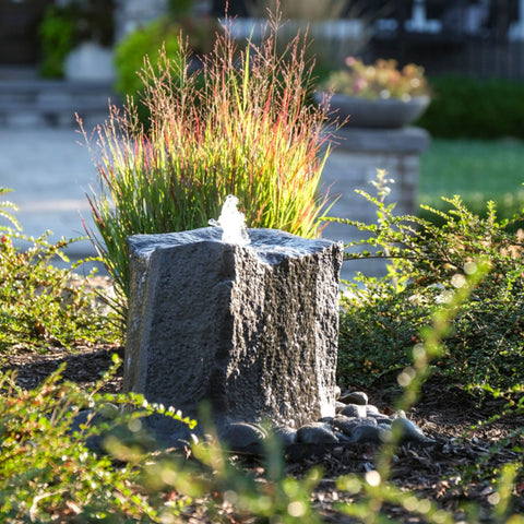 Blue Thumb Klamath Basin Stone Outdoor Fountain With Bright Ornamental Grass