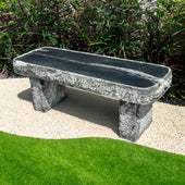 Blue Thumb Mountain Wave Granite 48 Garden Bench Placed On Beige Gravel With Curved Green Lawn And Garden Bushes