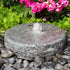 Thumbnail for Blue Thumb Natural Round Granite Stone Fountain With Vibrant Color Flowers And Shrubs Plants Behind