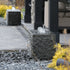 Thumbnail for Blue Thumb Triple Drilled Yasuyuki Stone Fountain With Paved Pathway And Yellow Shrubs