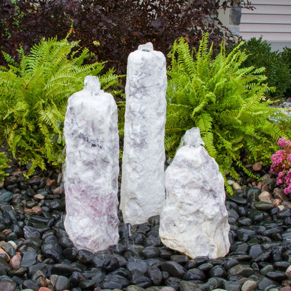 Blue Thumb Triple Lilac Chiseled Stone Fountain With Ferns In The Background