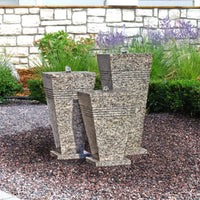 Thumbnail for Blue Thumb Triple Stone Urn Outdoor Fountain With White Brick Wall And Green Bushes