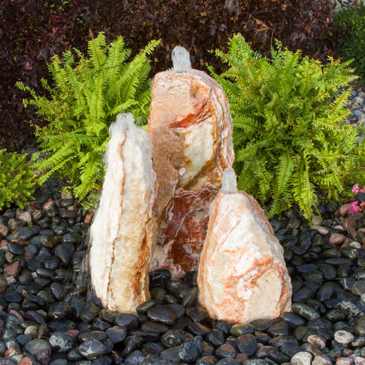 Blue Thumb Triple Sunset Chiseled Stone Fountain With Ferns Background