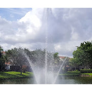 Cascade Aquarius Pond Fountain With Trees And A House In The Background