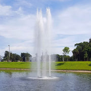 Cascade Orion Pond Fountain With Trees Under Clear Sky