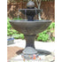 Thumbnail for Doppia Fountain With Dual Water Bowls And Shared Pedestal With Wooden Fence And Green Plants In The Background
