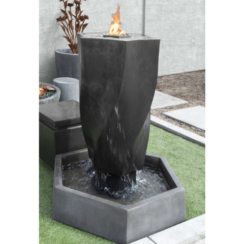 Dramatic Vortex Garden Feature with Flames With Gray Wall And Red Plant In The Background