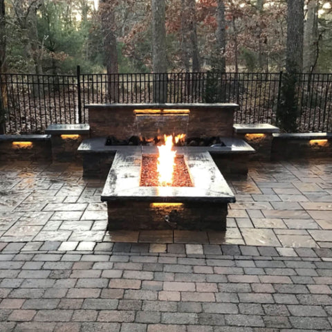 EasyPro Vianti Falls Spillway Kits Fire Feature On Wooded Backyard With Trees And Metal Fencing