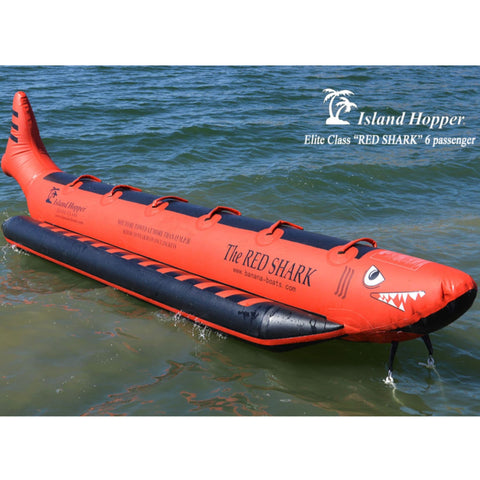 Elite Class 6 Person Red Shark Banana Boat Front View While Resting In Calm Water