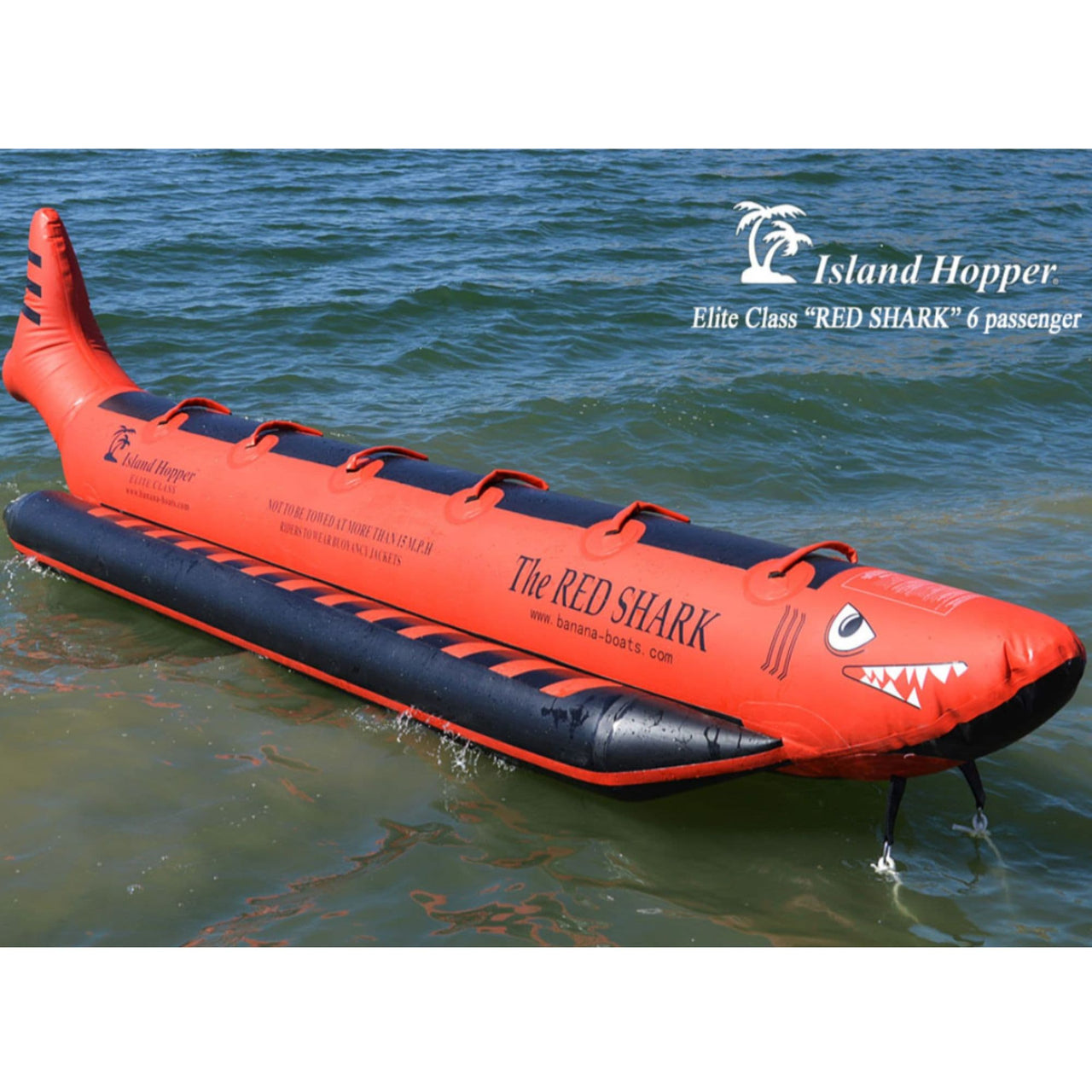 Elite Class 6 Person Red Shark Banana Boat Front View While Resting In Calm Water