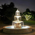 Thumbnail for Fiore Stone Four Seasons Fountain with Lion Base Pedestals and 12 Pond With Garden Lightings And Trees In The Background