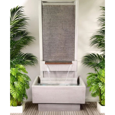 Giannini Garden Brentwood Fountain Besides A Palm Tress With Gray Wall Background
