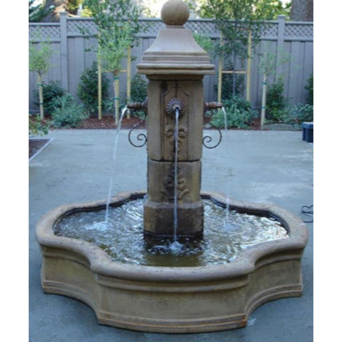 Giannini Garden Monaco Pond Fountain For Spouts With Gray Painted Fence And Plants In The Background