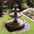 Thumbnail for Giannini Garden Newcastle Three Tier Pond Fountain With Wooden Fence And Plants In The Background