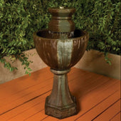 Gist Augusta Garden Water Fountain With Green Plants In The Background