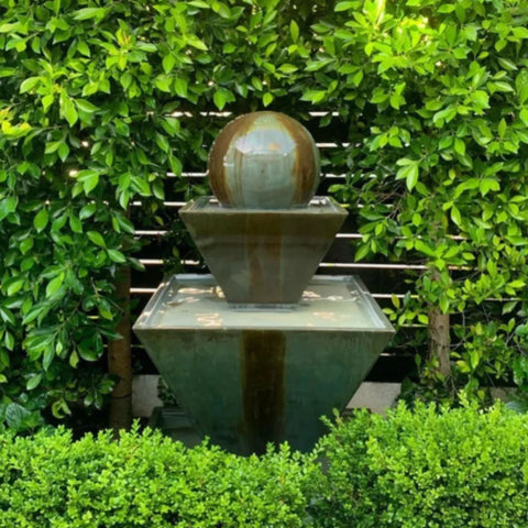 Gist Double Oblique With Ball Outdoor Water Fountain Surrounded By Green Plants