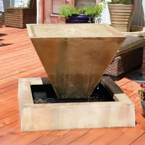 Gist Large Oblique Outdoor Fountain With Plants And Planters In The Background