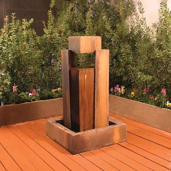 Gist Rocket Garden Water Fountain With Plants And Flowers In The Background
