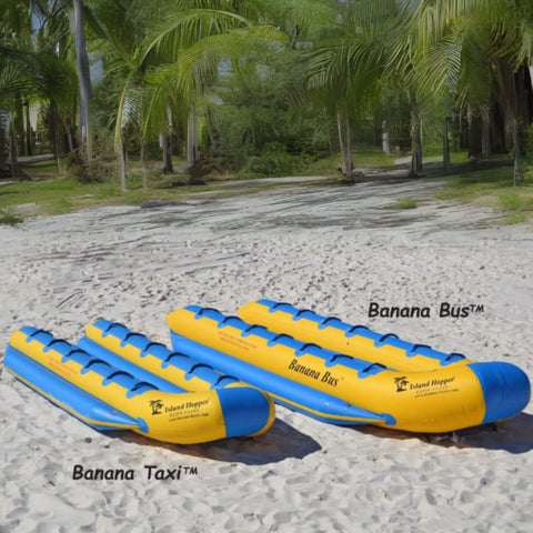 Island Hopper 12 Person Double Banana Boat Taxi Resting On White Sand With Palm Trees Background