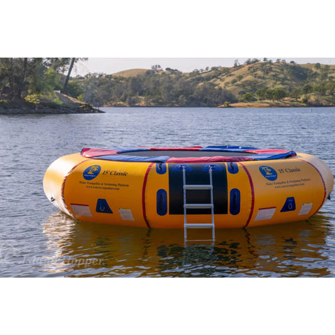 Island Hopper 15 Classic Water Trampoline Resting By The Lake Shore With Scenic View Background