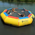 Thumbnail for Island Hopper 17 Bounce n Splash Water Bouncer Floating In Calm Water With Four Kids Resting