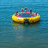 Thumbnail for Island Hopper 20 Acrobat Water Trampoline Floating On The Blue Calm Waters With Three Kids Are Jumping While The Other Three Are Sitting With Their Mother