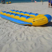 Thumbnail for Island Hopper Elite Class Banana Taxi 12 Person Banana Boat Resting On White Sand Beach