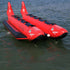 Thumbnail for Island Hopper Elite Class Red Shark 10 Person Banana Boat Front View While Resting In Calm Water