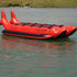 Thumbnail for Island Hopper Elite Class Red Shark 10 Person Banana Boat Side View While Resting In Calm Water