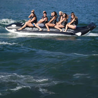 Thumbnail for Island Hopper Elite Class Whale Ride 10 Person Banana Boat With Smiling Riders Having Fun On The Deep Ocean Waves