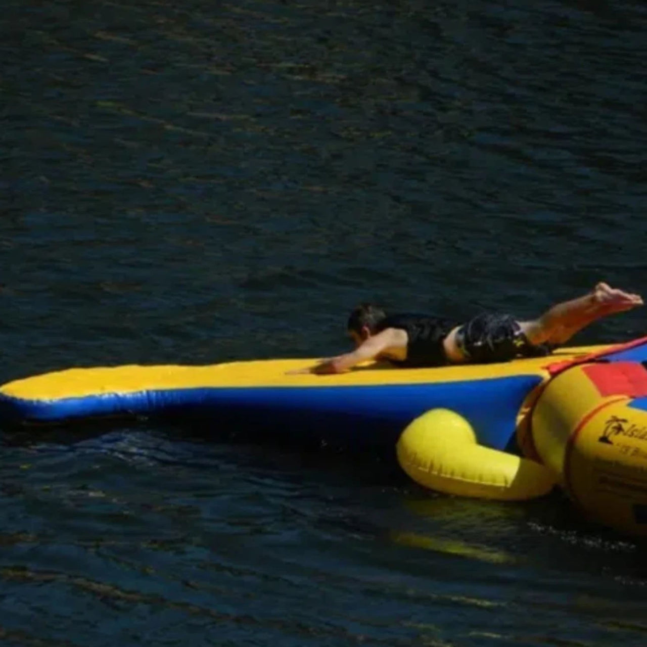 Island Hopper Gator 15 Water Park  With Kid Sliding In Deep Calm Water