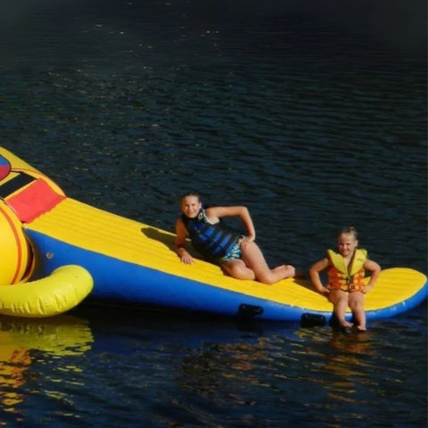 Island Hopper Gator 15 Water Park  With Kids Sitting On Gator Tail Slides In Calm Water