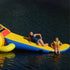 Thumbnail for Island Hopper Gator 15 Water Park  With Kids Sitting On Gator Tail Slides In Calm Water