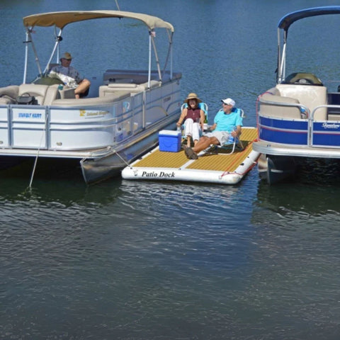 Island Hopper Patio Dock Attached Between Small Boats With Adults Enjoying a Sunbathing