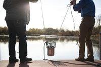 Thumbnail for Kasco De-Icer Unit Being Held By Two People On A Sling