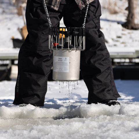 Kasco De-Icer With A Person Lifting It Out Of Water By Chains