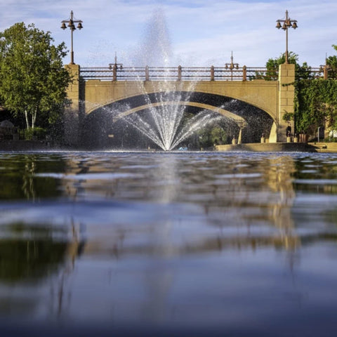 Kasco Mahogany Premium Fountain Nozzle Scenic Landscape View Centered In An Architectural Bridge