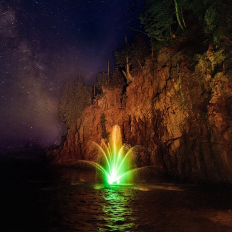 Kasco Marine Mahogany Premium Fountain Nozzle With Rocky Cliff Backdrop Beneath A Starry Night Sky