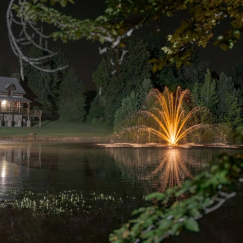 Kasco Marine Mighty Oak Premium Fountain Nozzle Scenic Landscape View With Water Reflections On A Calm Lake At Night