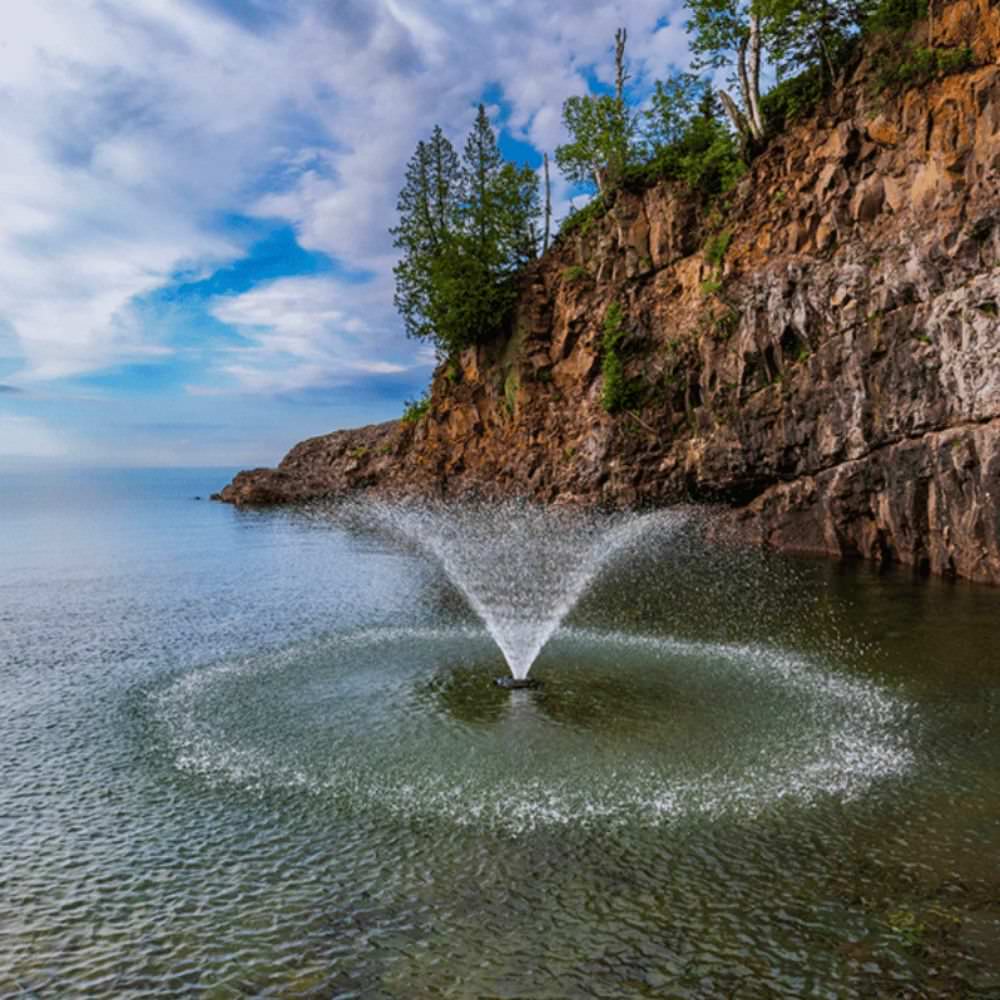 Kasco VFX Aerating Fountain On The Water With A Cliff In The Background
