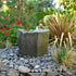 Thumbnail for Klamath Basin Stone Outdoor Fountain With Plants And Flowers In The Background