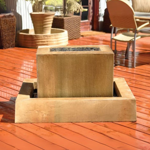 Linear Garden Water Fountain By Gist With Chairs And Planters In The Background