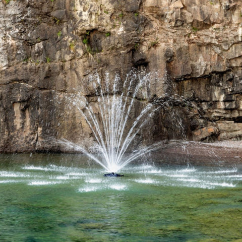 Mighty Oak Premium Fountain Nozzle With A Rocky Cliff Background
