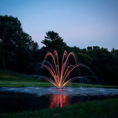 Mighty Oak Premium Fountain Nozzle With Water Reflections On A Calm Lake