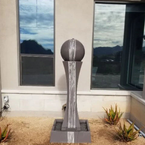 Minimalist I Garden Fountain with Sphere With Glass Windows In The Background