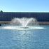 Thumbnail for Outdoor Water Solutions 1/2 HP Aerify Electric Pond Aerator Fountain On The Water With A Fence In The Background