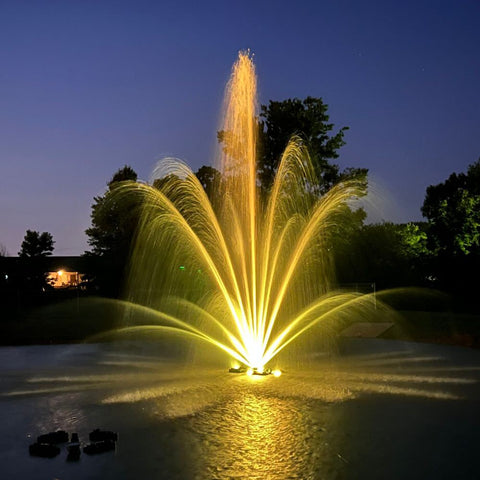 Outdoor Water Solutions Classic Series Electric Pond Fountain With Yellow Lights On The Water
