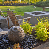 Thumbnail for Outdoor Granite Sphere Fountain With Wooden Garden Chairs On Fresh Green lawn