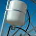 Outdoor Water Solutions Freeze Control Mounted On Metal Windmill Frame On Blue Sky Background